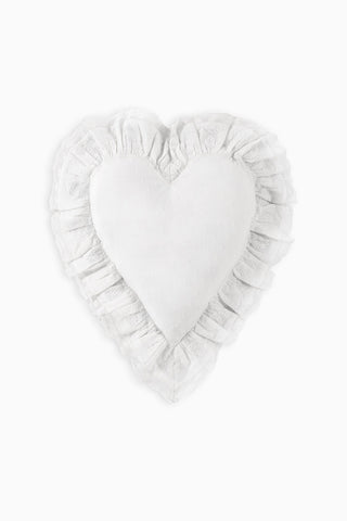 White heart-shaped pillow with gathered ruffled border