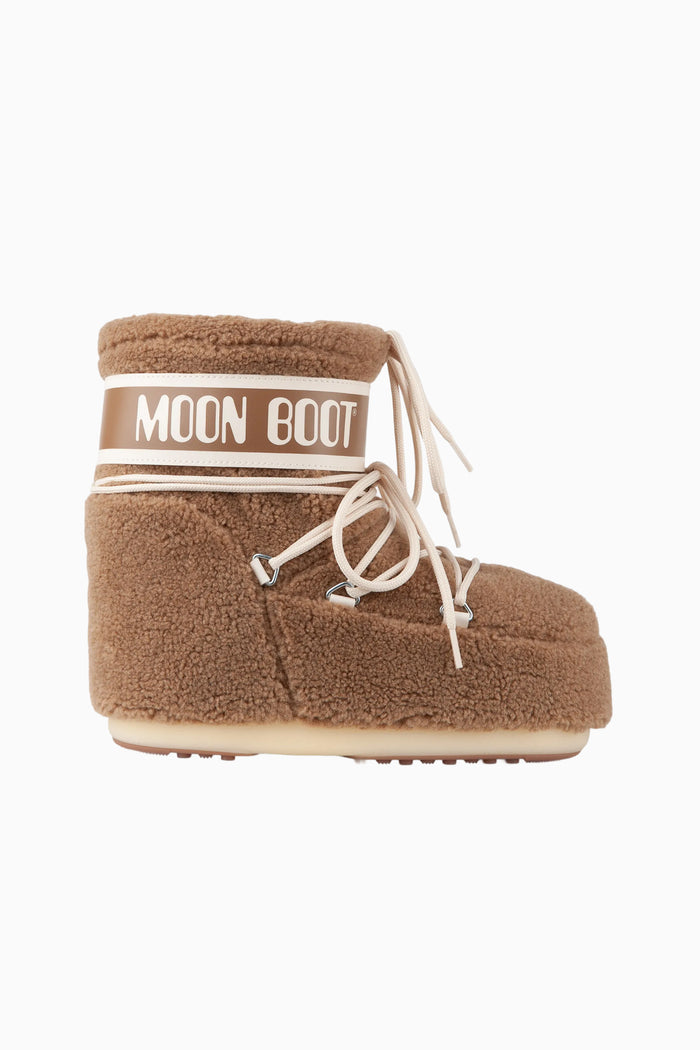 Tan fleece lace-up ankle boots with Moon Boot logo cuff and white tie laces