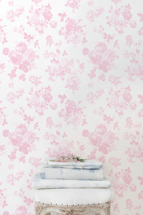 Pink floral rosette wallpaper pattern, light background with dense blossoms