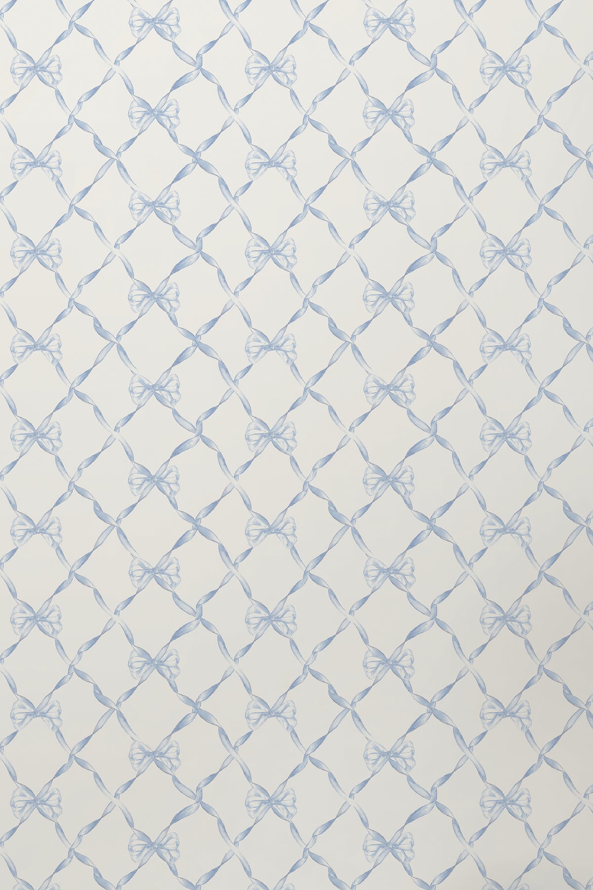 Close-up light blue bow trellis wallpaper pattern on white.