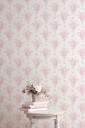 Light background wallpaper with repeating pink small floral bouquet silhouettes