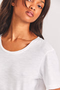Calix cotton tee in white, crew neck and short sleeves close-up